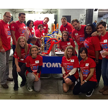Tomy employees give back